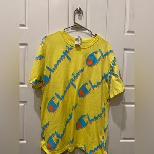 Neon yellow, orange, and light blue champion t-shirt. Men’s size XL.